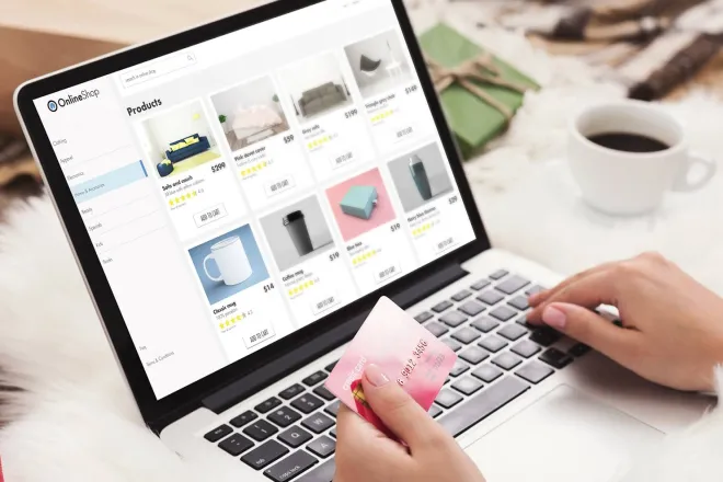 Woman shopping on laptop